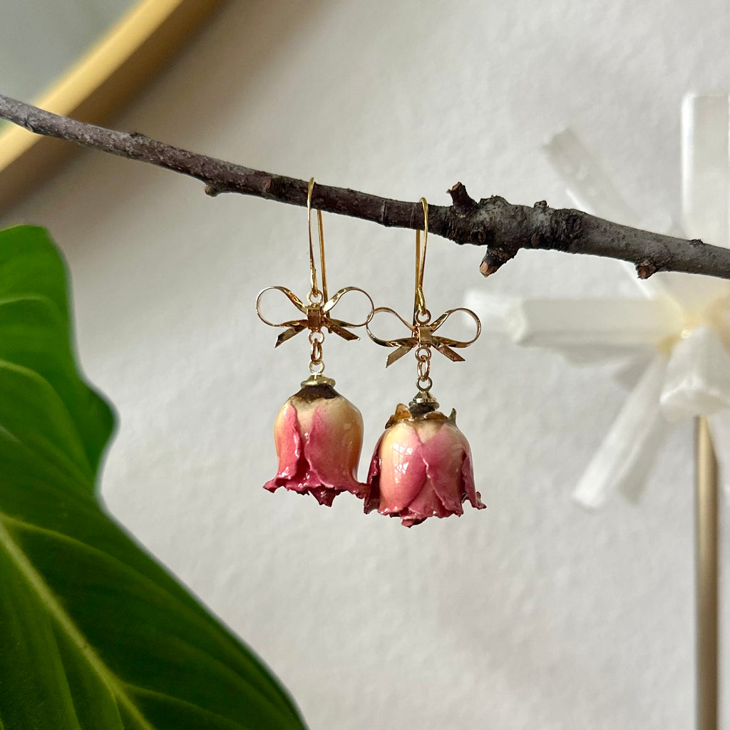 real rose bud earrings with gold bow accent, handcrafted