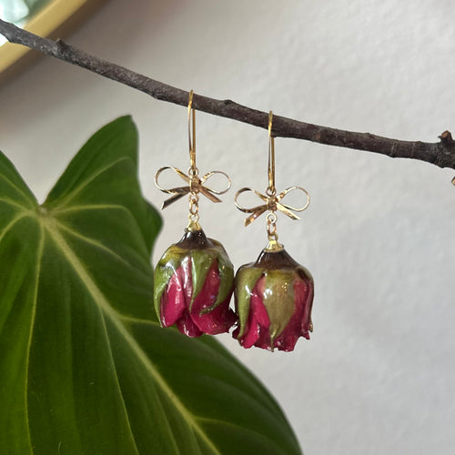 real rose bud earrings with gold bow accent, handcrafted